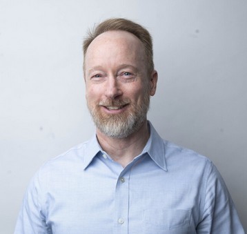 [small] Troy Glover portrait: man with short beard and dress shirt
